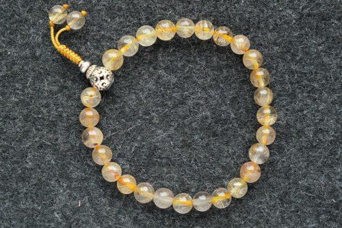 Буддийские четки-браслет из золотого кварца волосатика 27 бусин