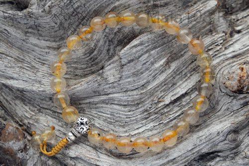 Буддийские четки-браслет из золотого кварца волосатика 27 бусин